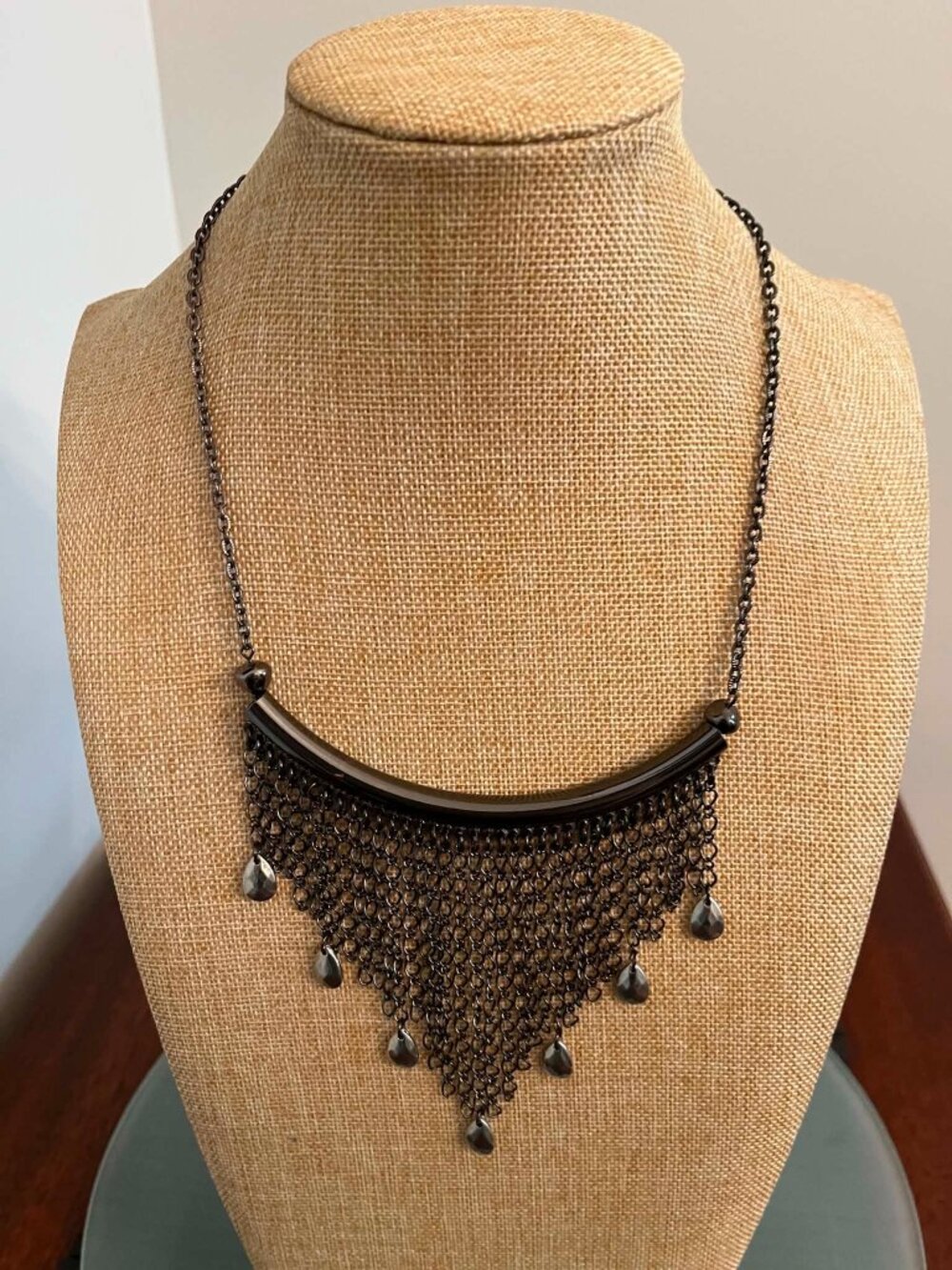 Gunmetal-colored, fringe style bib necklace